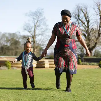 Adult and child in garden