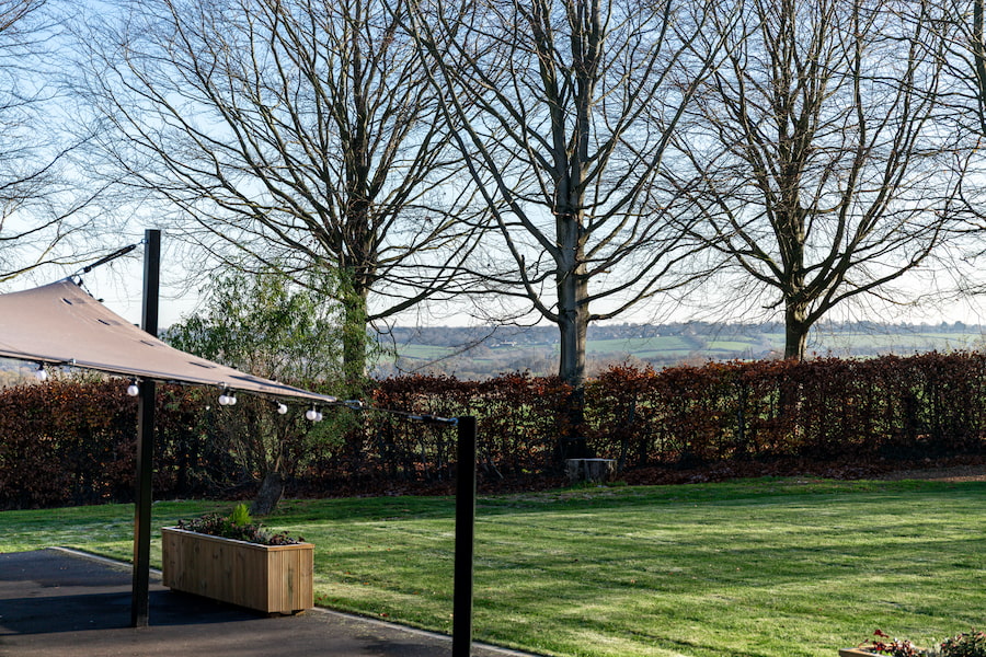 A view looking past the stretch tent overlooking the Northamptonshire countryside.