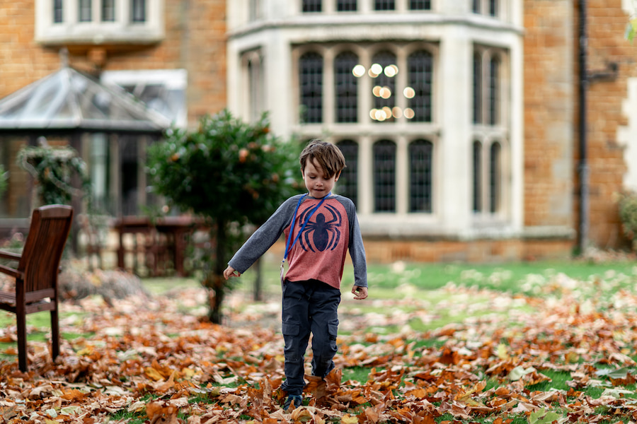 A child walking outside Highgate House conference centre.