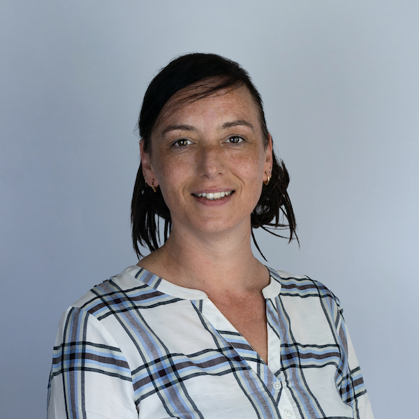 Mandy smiling at the camera.