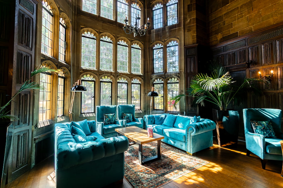 A public meeting space at Highgate House conference centre in Northamptonshire which has stunning large manor-house, historic windows