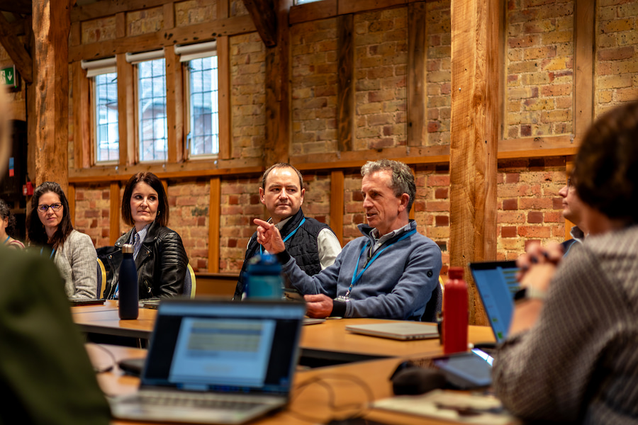 One of the trustees leading a devotional in the Chapel Barn at High Leigh.