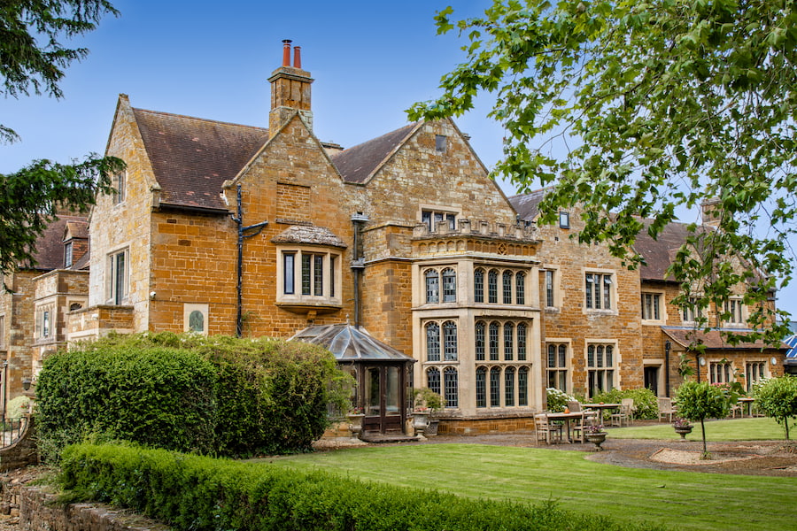 The exterior of Highgate House with the conservatory.