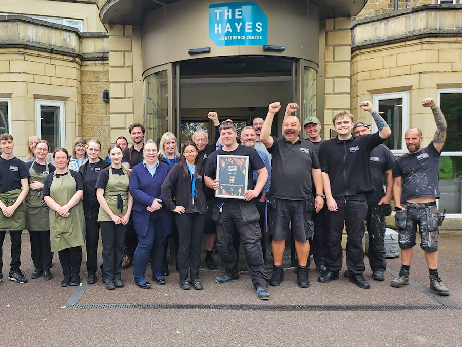 Some of the team at The Hayes celebrating outside the front with the award.