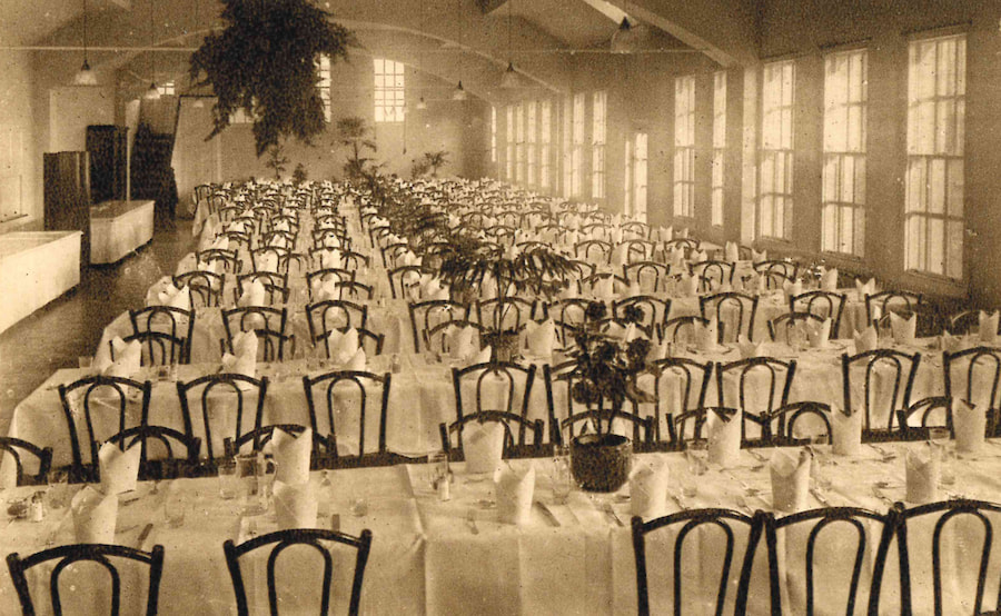 The Haddon Dining Room a long time ago with lots of tables set out ready for dinner.