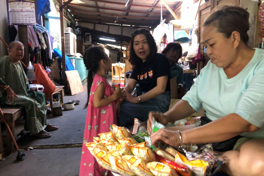 A CMS worker on the street in Thailand.