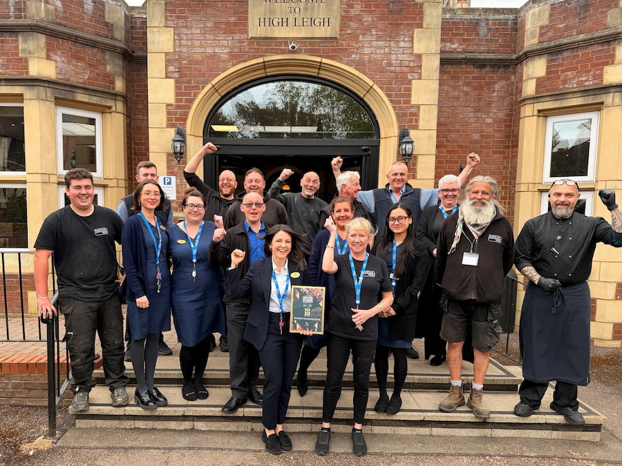 The team at High Leigh standing outside with the award celebrating.