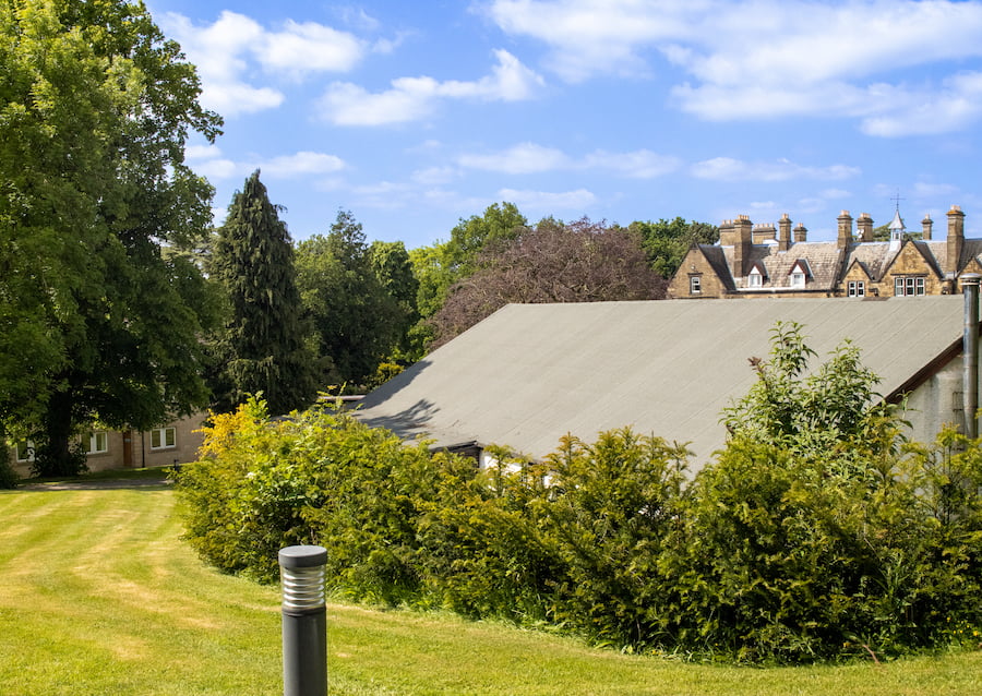The Main Conference Hall today with a view of The Hayes main house in the background and lots more trees and plants.