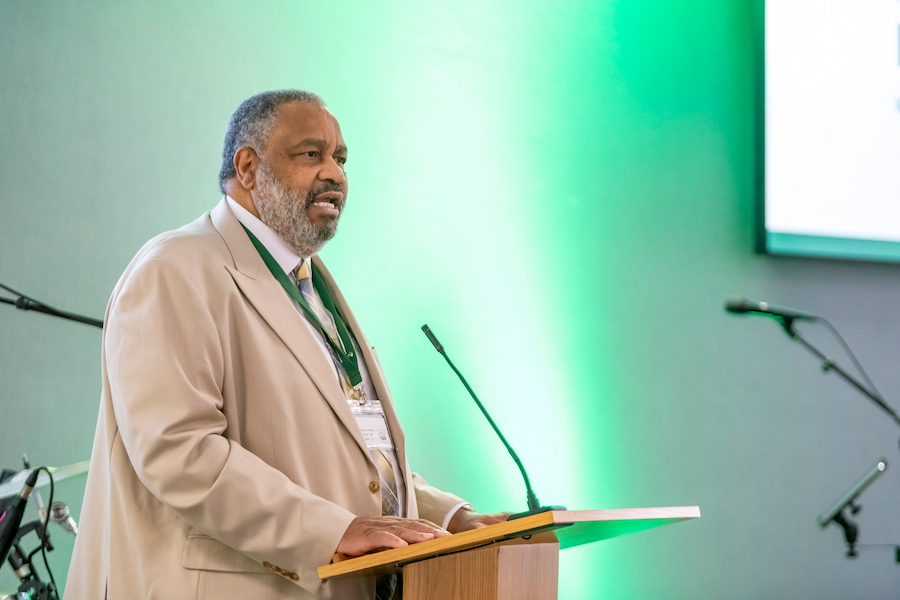 A man speaking at High Leigh.